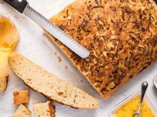 Our Famous Focaccia Loaf with Cheesy Romano-Red Pepper Dipping Sauce